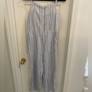 Blue and white jumpsuit with buttons